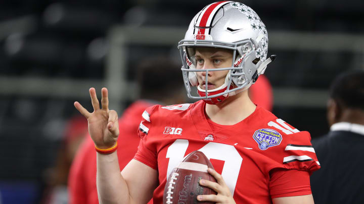 Dec 29, 2017; Arlington, TX, USA; Ohio State Buckeyes quarterback Joe Burrow (10) throws prior to the game against the Southern California Trojans in the 2017 Cotton Bowl at AT&T Stadium. Mandatory Credit: Matthew Emmons-USA TODAY Sports
