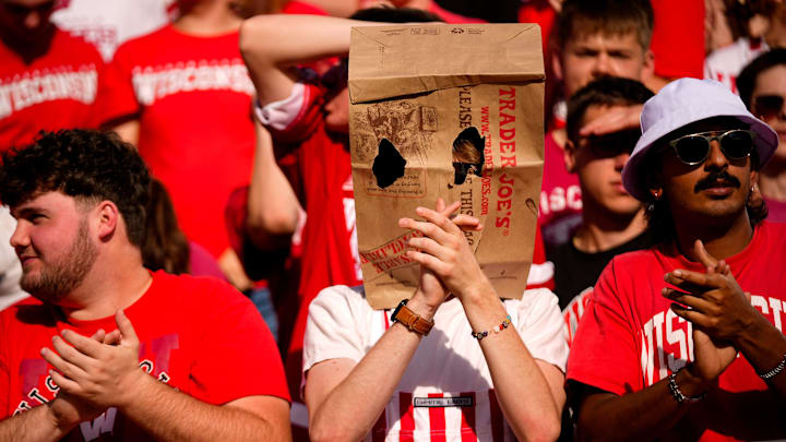 A Wisconsin Badger fan wears a bag on his head in the first half at Camp Randall Stadium on Saturday, Oct. 18, 2025 in Madison, Wisconsin. A Wisconsin Badger fan wears a bag on his head in the first half at Camp Randall Stadium on Saturday, Oct. 18, 2025 in Madison, Wisconsin.