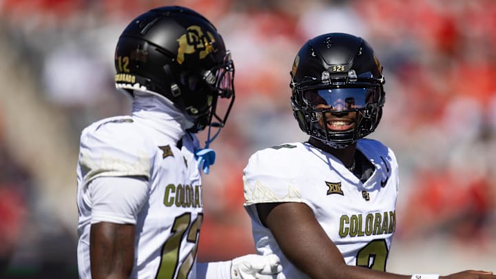 Oct 19, 2024; Tucson, Arizona, USA; Colorado Buffalos quarterback Shedeur Sanders (2) with wide receiver Travis Hunter (12) against the Arizona Wildcats at Arizona Stadium. Mandatory Credit: Mark J. Rebilas-Imagn Images