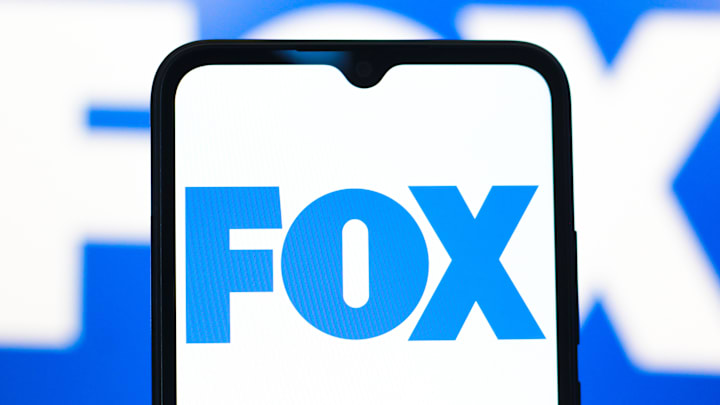 In this photo illustration, the Fox Corporation logo is seen...