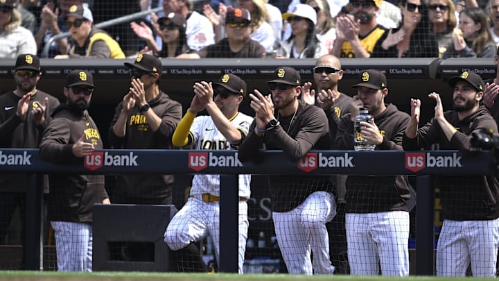 Mar 28, 2024; San Diego, California, USA; San Diego Padres starting pitcher Joe Musgrove (44) looks on alongside starting pitchers Michael King (34) and Dylan Cease (84) during the first inning against the San Francisco Giants at Petco Park. Mandatory Credit: Orlando Ramirez-Imagn Images