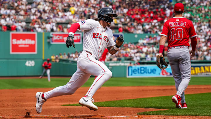 Jun 4, 2025; Boston, Massachusetts, USA; Boston Red Sox outfielder Jarren Duran (16) rounds third base to score against the Los Angeles Angels in the first inning at Fenway Park. Mandatory Credit: David Butler II-Imagn Images