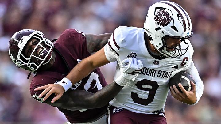 Sep 5, 2026; College Station, Texas, USA; Texas A&M Aggies safety Myles Davis (13) tackles Missouri State Bears quarterback Skyler Locklear (9) during the second quarter at Kyle Field. Mandatory Credit: Maria Lysaker-Imagn Images Sep 5, 2026; College Station, Texas, USA; Texas A&M Aggies safety Myles Davis (13) tackles Missouri State Bears quarterback Skyler Locklear (9) during the second quarter at Kyle Field. Mandatory Credit: Maria Lysaker-Imagn Images