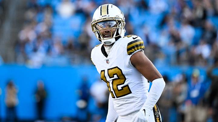 New Orleans Saints wide receiver Chris Olave (12) looks on during the fourth quarter against the Carolina Panthers at Bank of America Stadium. New Orleans Saints wide receiver Chris Olave (12) looks on during the fourth quarter against the Carolina Panthers at Bank of America Stadium.
