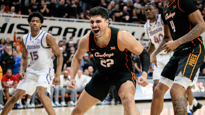 Feb 18, 2026; Stillwater, Oklahoma, USA; Oklahoma State Cowboys forward Parsa Fallah (22) reacts to a play during the first half against the Kansas Jayhawks at Gallagher-Iba Arena. Mandatory Credit: William Purnell-Imagn Images Feb 18, 2026; Stillwater, Oklahoma, USA; Oklahoma State Cowboys forward Parsa Fallah (22) reacts to a play during the first half against the Kansas Jayhawks at Gallagher-Iba Arena. Mandatory Credit: William Purnell-Imagn Images