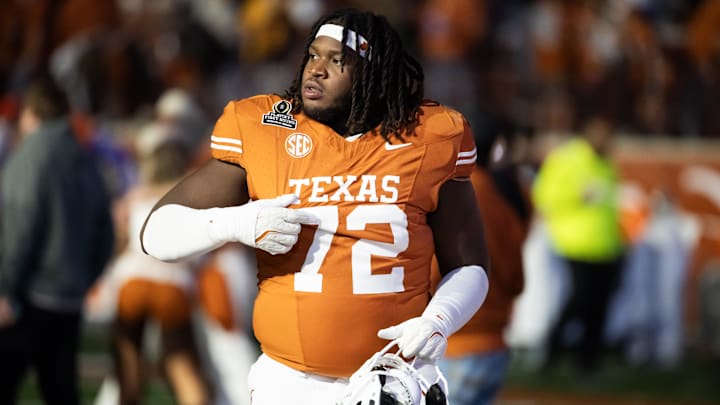 Dec 21, 2024; Austin, Texas, USA; Texas Longhorns offensive lineman Neto Umeozulu (72) against the Clemson Tigers during the CFP National playoff first round at Darrell K Royal-Texas Memorial Stadium. Mandatory Credit: Mark J. Rebilas-Imagn Images