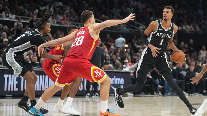 Oct 23, 2026; Austin, Texas, USA; San Antonio Spurs forward Victor Wembanyama (1) looks to drives to the basket against Houston Rockets center Alperen Şengün (28) during the second half at Moody Center. Oct 23, 2026; Austin, Texas, USA; San Antonio Spurs forward Victor Wembanyama (1) looks to drives to the basket against Houston Rockets center Alperen Şengün (28) during the second half at Moody Center.