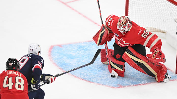 Team Canada goaltender Jordan Binnington blocks a shot by Team USA forward Jake Guentzel during the 4 Nations Final.