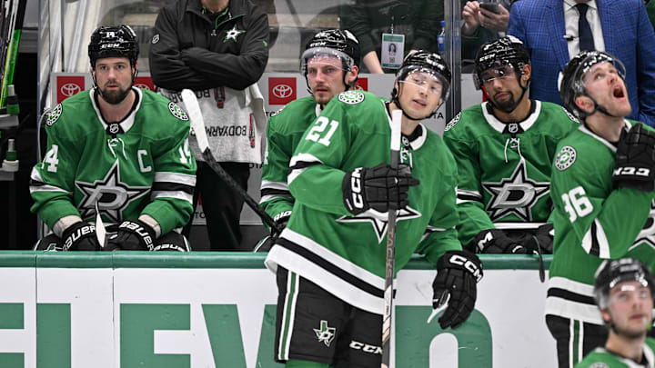 Dallas Stars players look on as forward Jamie Benn’s goal against the Utah Hockey Club is under review.