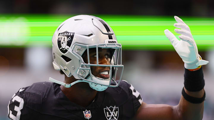 Nov 17, 2024; Miami Gardens, Florida, USA; Las Vegas Raiders linebacker Amari Gainer (53) reacts from the bench against the Miami Dolphins during the fourth quarter at Hard Rock Stadium. Mandatory Credit: Sam Navarro-Imagn Images Nov 17, 2024; Miami Gardens, Florida, USA; Las Vegas Raiders linebacker Amari Gainer (53) reacts from the bench against the Miami Dolphins during the fourth quarter at Hard Rock Stadium. Mandatory Credit: Sam Navarro-Imagn Images