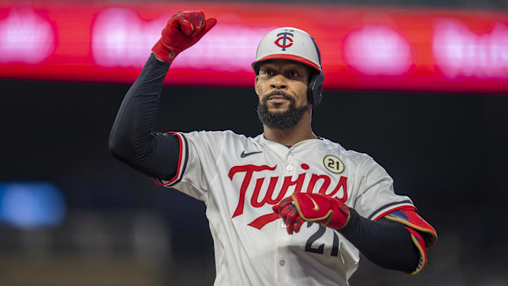 Sep 15, 2025; Minneapolis, Minnesota, USA; Minnesota Twins center fielder Byron Buxton (21) celebrates hitting a single against the New York Yankees in the fifth inning at Target Field. Mandatory Credit: Jesse Johnson-Imagn Images
