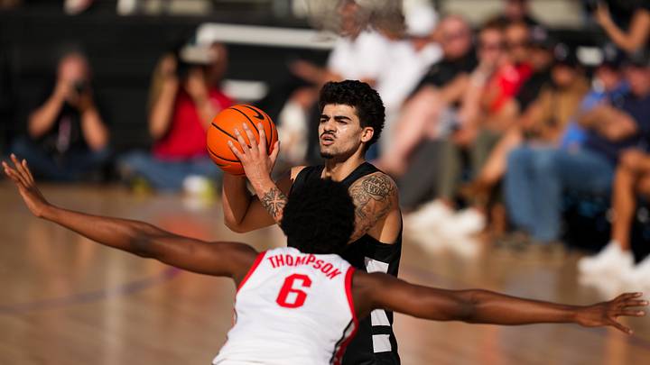 Oct 7, 2026; Mason, OH, USA;  Cincinnati Bearcats forward Tyler Tejada (8) controls the ball against Ohio State Buckeyes forward Anthony Thompson (6) in the first half during the 2026 CareSource Invitational at the Lindner Family Tennis Center. Mandatory Credit: Aaron Doster-Imagn Images