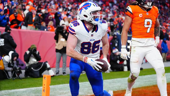 Jan 17, 2026; Denver, CO, USA; Buffalo Bills tight end Dalton Kincaid (86) celebrates after a touchdown against Denver Broncos safety Talanoa Hufanga (9) during the fourth quarter of an AFC Divisional Round playoff game at Empower Field at Mile High. Jan 17, 2026; Denver, CO, USA; Buffalo Bills tight end Dalton Kincaid (86) celebrates after a touchdown against Denver Broncos safety Talanoa Hufanga (9) during the fourth quarter of an AFC Divisional Round playoff game at Empower Field at Mile High.