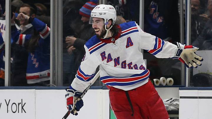 Feb 25, 2020; Uniondale, New York, USA; New York Rangers center Mika Zibanejad (93) celebrates his game winning goal against the New York Islanders during overtime at Nassau Veterans Memorial Coliseum. Mandatory Credit: Brad Penner-USA TODAY Sports Feb 25, 2020; Uniondale, New York, USA; New York Rangers center Mika Zibanejad (93) celebrates his game winning goal against the New York Islanders during overtime at Nassau Veterans Memorial Coliseum. Mandatory Credit: Brad Penner-USA TODAY Sports