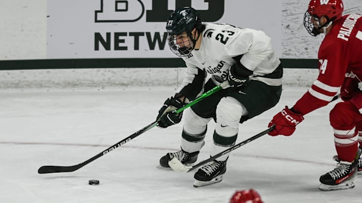 MSU's Shane Vansaghi moves the puck against Wisconsin, Thursday, Jan. 2, 2024, at Munn Ice Arena. MSU won 4-3. MSU's Shane Vansaghi moves the puck against Wisconsin, Thursday, Jan. 2, 2024, at Munn Ice Arena. MSU won 4-3.