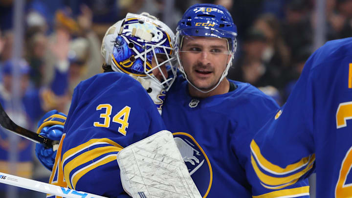 Buffalo Sabres goaltender Alex Lyon and center Sam Carrick Buffalo Sabres goaltender Alex Lyon and center Sam Carrick