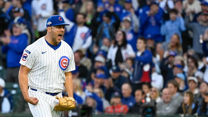 Jameson Taillon of Chicago Cubs reacts to big pla