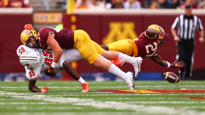 Sep 25, 2021; Minneapolis, Minnesota, USA; Minnesota Gophers linebacker Jack Gibbens (47) tackles Bowling Green Falcons wide receiver Cavon Croom (85) during the third quarter at Huntington Bank Stadium. Mandatory Credit: Harrison Barden-USA TODAY Sports