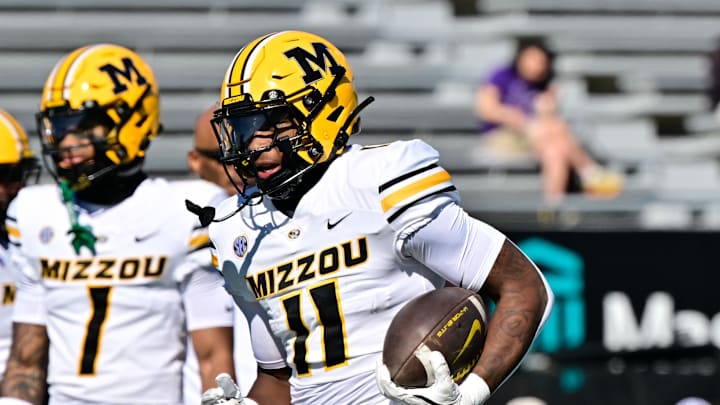 Oct 12, 2024; Amherst, Massachusetts, USA; Missouri Tigers running back Kewan Lacy (11) warms up before a game against the Massachusetts Minutemen at Warren McGuirk Alumni Stadium. Mandatory Credit: Eric Canha-Imagn Images