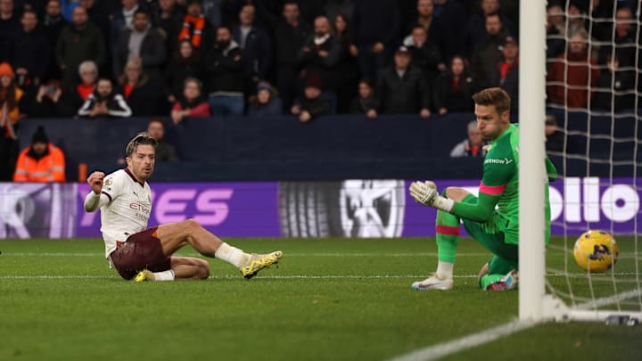 Jack Grealish (left) fired Man City in front against Luton