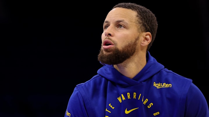 Golden State Warriors guard Stephen Curry warms up before a game against the Orlando Magic.
