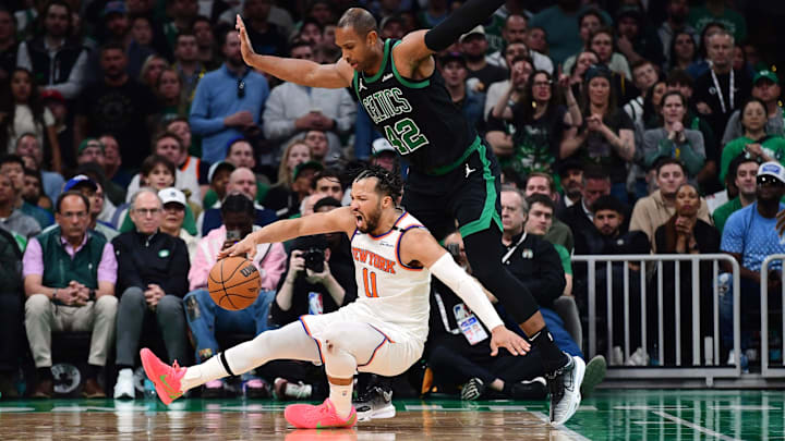 May 14, 2025; Boston, Massachusetts, USA; Boston Celtics center Al Horford (42) is called for a foul on New York Knicks guard Jalen Brunson (11) in the second half during game five of the second round for the 2025 NBA Playoffs at TD Garden. Mandatory Credit: Bob DeChiara-Imagn Images