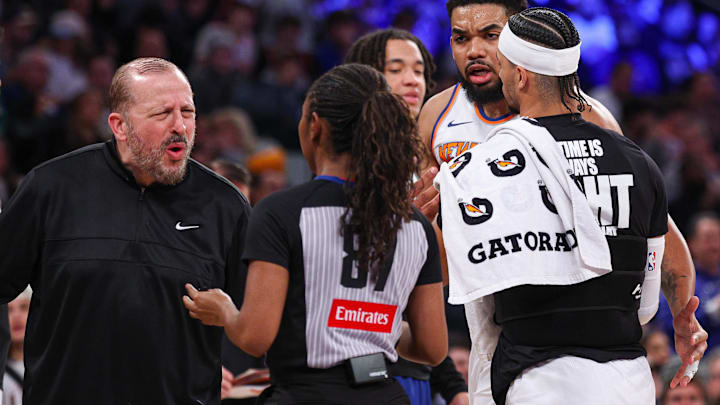 Jan 20, 2025; New York, New York, USA; New York Knicks head coach Tom Thibodeau talks with referee Danielle Scott (87) after a call against center Karl-Anthony Towns (32) during the first half against the Atlanta Hawks at Madison Square Garden. Mandatory Credit: Vincent Carchietta-Imagn Images