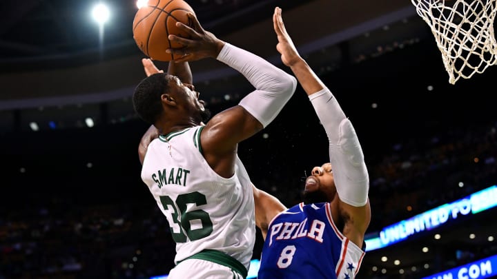Oct 9, 2017; Boston, MA, USA; Boston Celtics guard Marcus Smart (36) attempts a shot over Philadelphia 76ers center Jahlil Okafor (8) during the first half at the TD Garden. Mandatory Credit: Brian Fluharty-USA TODAY Sports Oct 9, 2017; Boston, MA, USA; Boston Celtics guard Marcus Smart (36) attempts a shot over Philadelphia 76ers center Jahlil Okafor (8) during the first half at the TD Garden. Mandatory Credit: Brian Fluharty-USA TODAY Sports