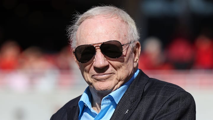 Nov 16, 2024; Fayetteville, Arkansas, USA; Dallas Cowboys owner and member of the 1964 Arkansas Razorbacks National Championship team, Jerry Jones, looks on as the team is honored during the first half against the Texas Longhorns at Donald W. Reynolds Razorback Stadium. Mandatory Credit: Nelson Chenault-Imagn Images