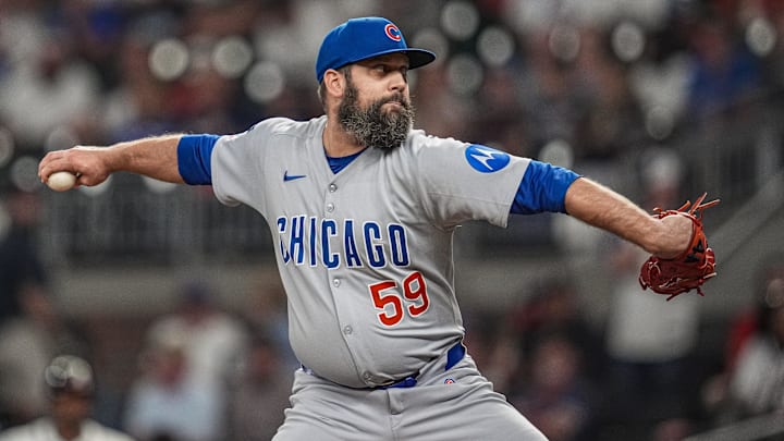 Sep 10, 2025; Cumberland, Georgia, USA; Chicago Cubs relief pitcher Andrew Kittredge (59) pitches against the Atlanta Braves during the ninth inning at Truist Park. Mandatory Credit: Dale Zanine-Imagn Images