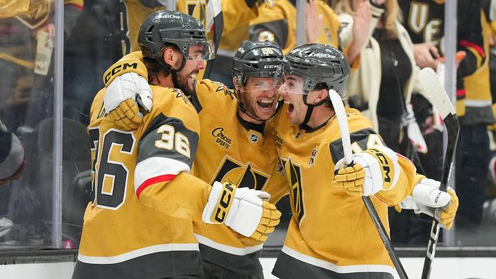 Vegas Golden Knights center Raphael Lavoie (36) celebrates his first NHL goal with center Nic Dowd (26) and defenseman Ville Heinola (14) in the third period against the Ottawa Senators at T-Mobile Arena. Mandatory Credit: Candice Ward-Imagn Images Vegas Golden Knights center Raphael Lavoie (36) celebrates his first NHL goal with center Nic Dowd (26) and defenseman Ville Heinola (14) in the third period against the Ottawa Senators at T-Mobile Arena. Mandatory Credit: Candice Ward-Imagn Images