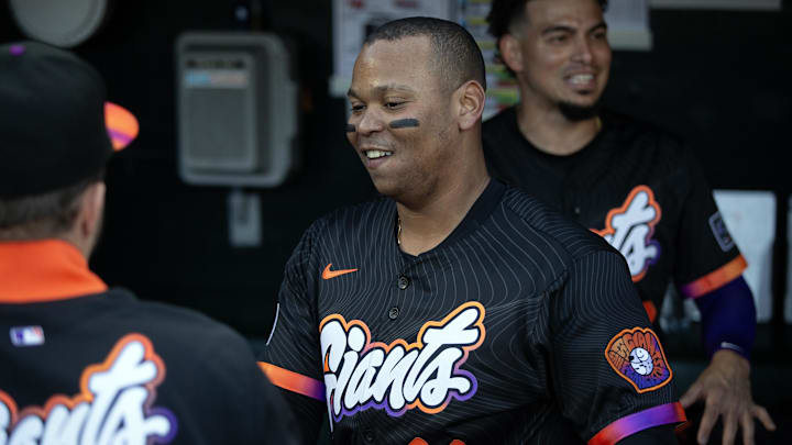San Francisco Giants designated hitter Rafael Devers (16) greets his new teammates in the dugout before taking on the Cleveland Guardians at Oracle Park. San Francisco Giants designated hitter Rafael Devers (16) greets his new teammates in the dugout before taking on the Cleveland Guardians at Oracle Park.