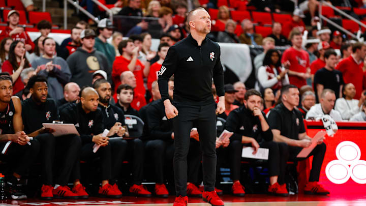 Feb 12, 2025; Raleigh, North Carolina, USA; Louisville Cardinals head coach Pat Kelsey reacts during the first half of the game against the North Carolina State Wolfpack at Lenovo Center. Mandatory Credit: Jaylynn Nash-Imagn Images