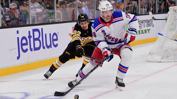 Sep 29, 2026; Boston, Massachusetts, USA; New York Rangers forward Oliver Bjorkstrand (28) controls the puck ahead of Boston Bruins center Marat Khusnutdinov (92) during the first period at TD Garden. Mandatory Credit: Bob DeChiara-Imagn Images Sep 29, 2026; Boston, Massachusetts, USA; New York Rangers forward Oliver Bjorkstrand (28) controls the puck ahead of Boston Bruins center Marat Khusnutdinov (92) during the first period at TD Garden. Mandatory Credit: Bob DeChiara-Imagn Images