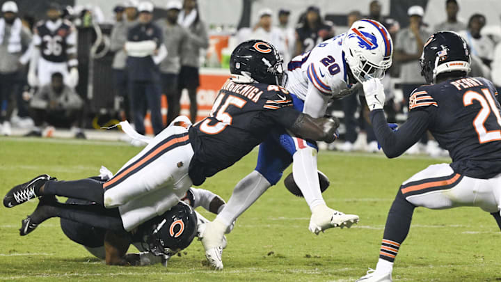 Amen Ogbongbemiga strips the ball from Frank Gore Jr. during Sunday night's 38-0 Bears win over Buffalo. Amen Ogbongbemiga strips the ball from Frank Gore Jr. during Sunday night's 38-0 Bears win over Buffalo.