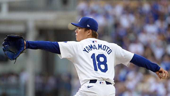 Los Angeles Dodgers pitcher Yoshinobu Yamamoto (18) pitches against the San Diego Padres in the second inning during game five of the NLDS for the 2024 MLB Playoffs at Dodger Stadium on Oct 11.
