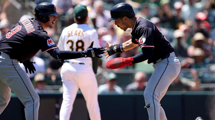Jun 22, 2025; West Sacramento, California, USA; Cleveland Guardians left fielder Steven Kwan (38) celebrates with first baseman Kyle Manzardo (9) after scoring a run against the Athletics during the fifth inning at Sutter Health Park. Mandatory Credit: Dennis Lee-Imagn Images