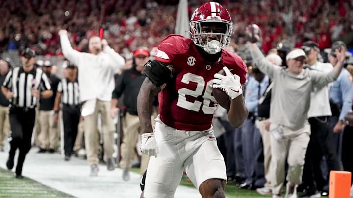 Dec 2, 2023; Atlanta, GA, USA;  Alabama Crimson Tide running back Jam Miller (26) runs to the end zone for a touchdown against the Georgia Bulldogs at Mercedes-Benz Stadium. Mandatory Credit: Gary Cosby Jr.-USA TODAY Sports