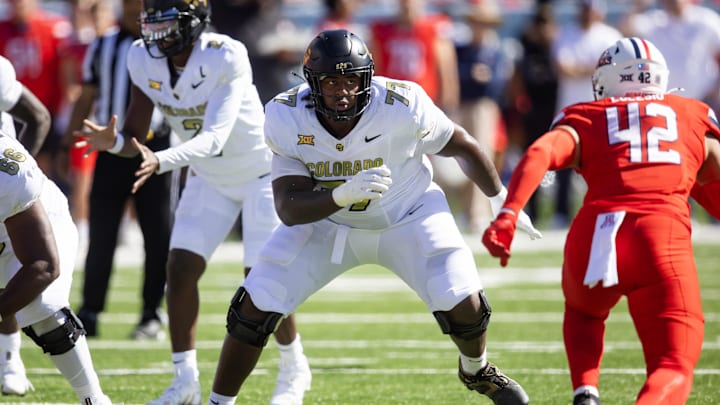 Oct 19, 2024; Tucson, Arizona, USA; Colorado Buffalos offensive tackle Jordan Seaton (77) against the Arizona Wildcats at Arizona Stadium. Mandatory Credit: Mark J. Rebilas-Imagn Images