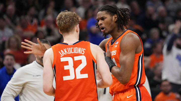 Mar 23, 2025; Milwaukee, WI, USA;  Illinois Fighting Illini forward Morez Johnson Jr. (21) talks with guard Kasparas Jakucionis (32) during the first half against the Kentucky Wildcats in the second round of the NCAA Tournament at Fiserv Forum. Mandatory Credit: Jeff Hanisch-Imagn Images