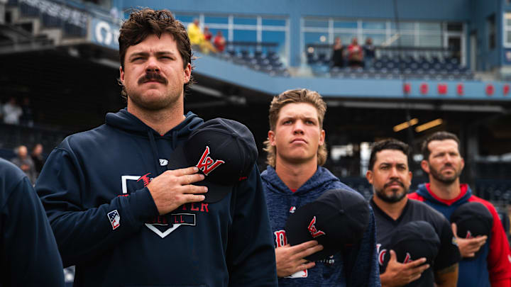 Pitchers Payton Tolle (left) and Connelly Early (second from left) stand for the national anthem ahead of Triple-A Worcester's game at Polar Park on Aug. 21, 2025.