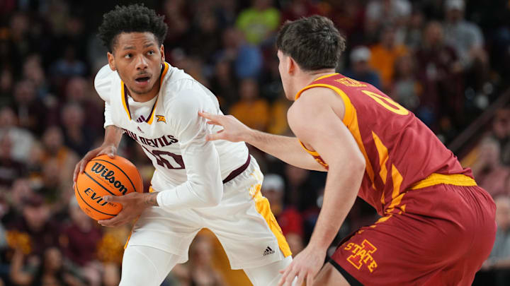 Iowa State Cyclones guard Nate Heise (0) guards Arizona State Sun Devils guard BJ Freeman (10) during the first half at Desert Financial Arena.