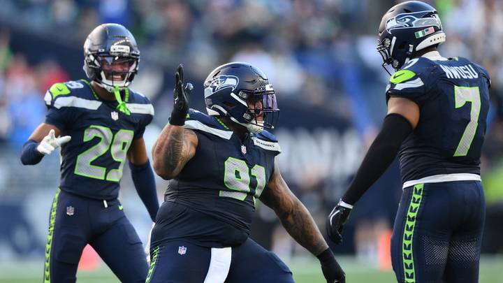 Oct 4, 2026; Seattle, Washington, USA; Seattle Seahawks defensive tackle Byron Murphy II (91) celebrates with Seattle Seahawks linebacker Uchenna Nwosu (7) after a fumble recovery against the Los Angeles Chargers during the second half at Lumen Field. Mandatory Credit: Steven Bisig-Imagn Images Oct 4, 2026; Seattle, Washington, USA; Seattle Seahawks defensive tackle Byron Murphy II (91) celebrates with Seattle Seahawks linebacker Uchenna Nwosu (7) after a fumble recovery against the Los Angeles Chargers during the second half at Lumen Field. Mandatory Credit: Steven Bisig-Imagn Images