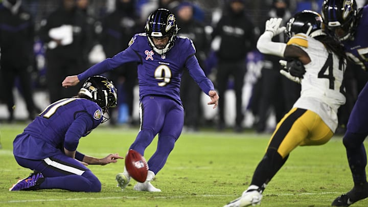 Dec 21, 2024; Baltimore, Maryland, USA;  Baltimore Ravens place kicker Justin Tucker (9) kicks a 50-yard field goal during the first half against the Pittsburgh Steelers at M&T Bank Stadium. Mandatory Credit: Tommy Gilligan-Imagn Images