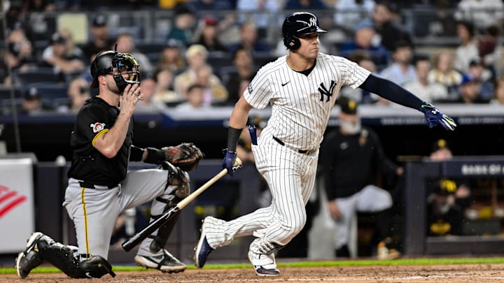 New York Yankees outfielder Juan Soto (22) hits a single against the Pittsburgh Pirates during the third inning at Yankee Stadium.