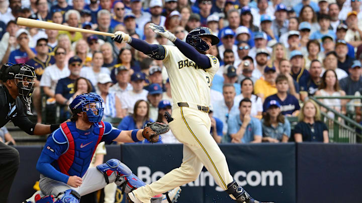 Oct 4, 2025; Milwaukee, Wisconsin, USA; Milwaukee Brewers second baseman Brice Turang (2) hits an RBI double against the Chicago Cubs during the first inning of game one of the NLDS round for the 2025 MLB playoffs at American Family Field. Mandatory Credit: Benny Sieu-Imagn Images Oct 4, 2025; Milwaukee, Wisconsin, USA; Milwaukee Brewers second baseman Brice Turang (2) hits an RBI double against the Chicago Cubs during the first inning of game one of the NLDS round for the 2025 MLB playoffs at American Family Field. Mandatory Credit: Benny Sieu-Imagn Images