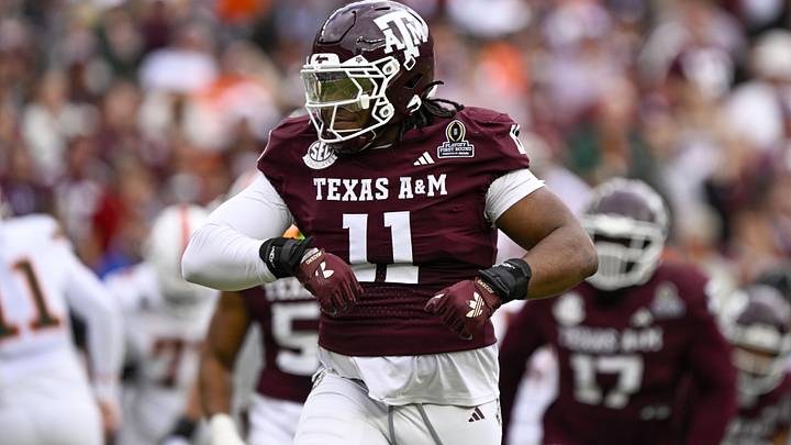 Dec 20, 2025; College Station, TX, USA; Texas A&M Aggies defensive tackle Tyler Onyedim (11) celebrates during the game between the Aggies and the Hurricanes at Kyle Field. Dec 20, 2025; College Station, TX, USA; Texas A&M Aggies defensive tackle Tyler Onyedim (11) celebrates during the game between the Aggies and the Hurricanes at Kyle Field.