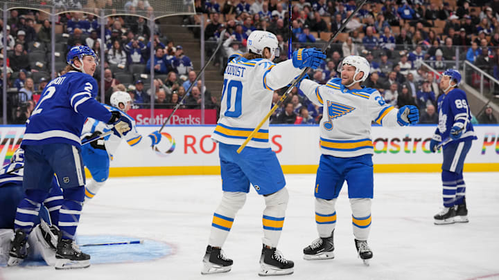 Nathan Walker celebrating a goal with Oskar Sundqvist