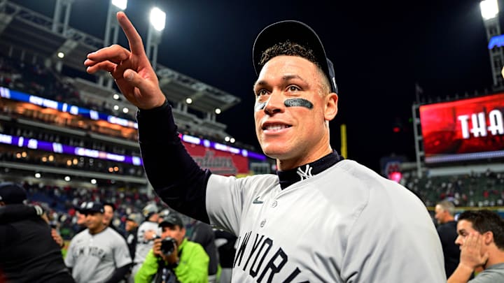 Oct 19, 2024; Cleveland, Ohio, USA; New York Yankees outfielder Aaron Judge (99) celebrates after beating the Cleveland Guardians during game five of the ALCS for the 2024 MLB playoffs at Progressive Field. 