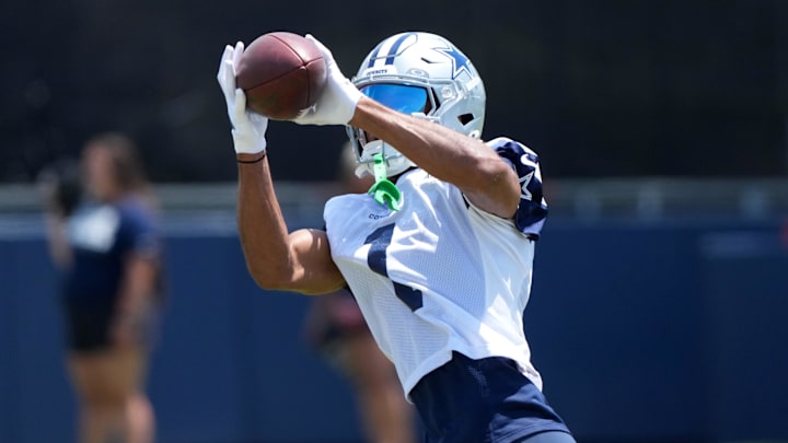 Dallas Cowboys receiver Jalen Tolbert catches the ball at training camp at the River Ridge Fields. Dallas Cowboys receiver Jalen Tolbert catches the ball at training camp at the River Ridge Fields.